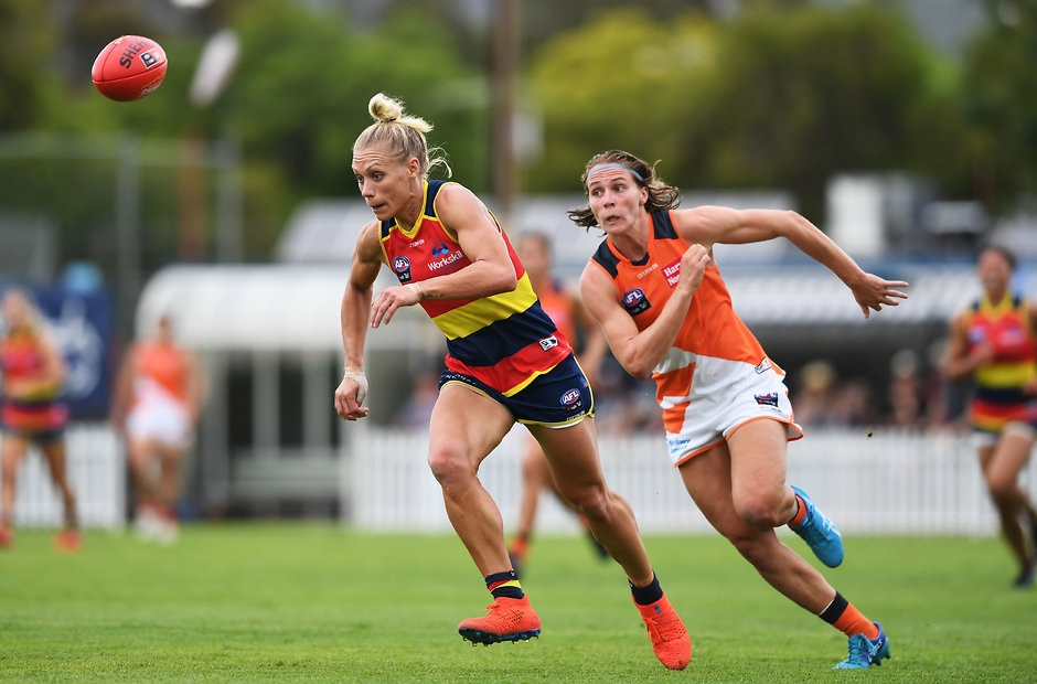 AFLW 2019 Round 06 - Adelaide v GWS ADELAIDE, AUSTRALIA - MARCH 10: Erin Phillips of the Adelaide Crows chased by Pepa Randall of the Giantsduring the round six AFLW match between the Adelaide Crows and the Greater Western Sydney Giants at Unley Oval on March 10, 2019 in Adelaide, Australia. (Photo by Mark Brake/Getty Images)
